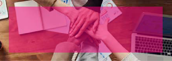 Hands of different people joined together in the center of a table, inside an office. Above is a magenta box with the text Social.